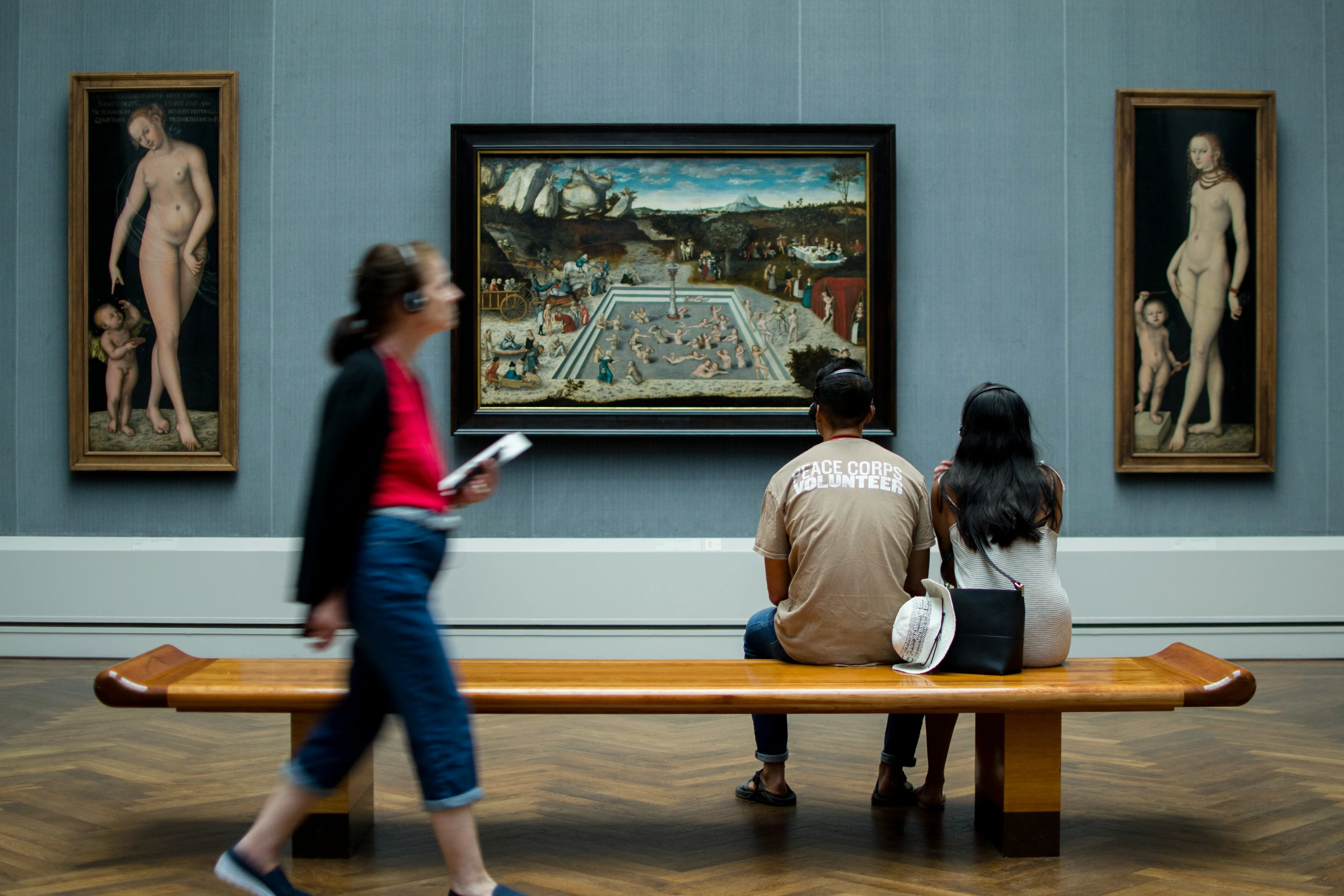 Visitor scanning QR code at museum exhibit